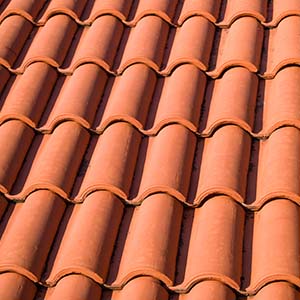 South Creek Roofing & Waterproofing Inc. Tile Roofing - click to view tile roofing products we carry - Close-up of roof with orange clay tiles